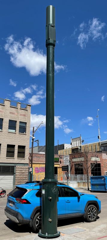 5G street-level pole installation representing 