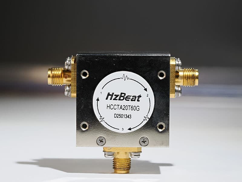 Ferrite RF circulator used in microwave systems with three coaxial ports