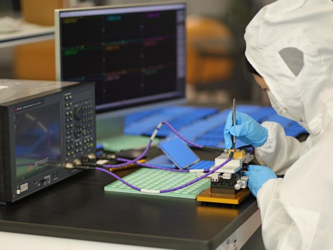 RF technician testing an RF component with a vector network analyzer