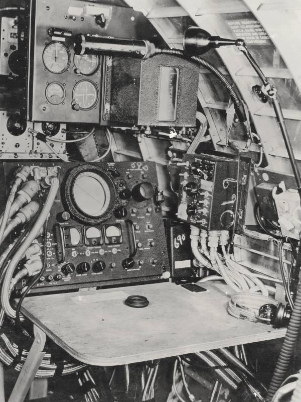 WWII B-17 aircraft H2X radar station with operator in cabin