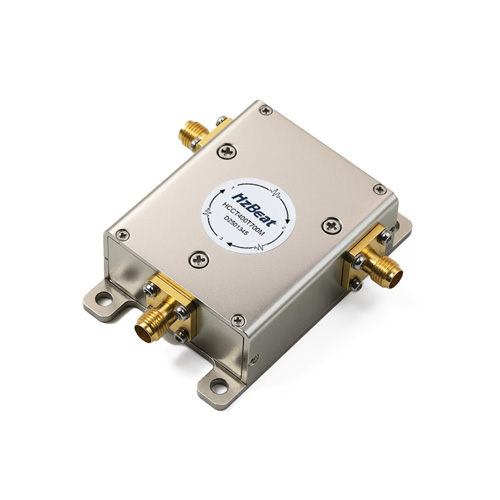 A ferrite RF circulator around 1 GHz with three coaxial ports.